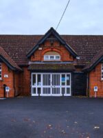 Photograph showing the outside of the training hall